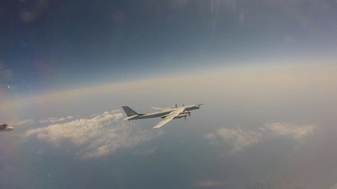 Russian Tu-95 strategic bomber flies during Russian-Chinese military aerial exercises to patrol the Asia-Pacific region, at an unidentified location, in this still image taken from a video released May 24, 2022. (Russian Defence Ministry/Handout via Reuters)