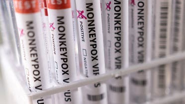 Test tubes labeled “Monkeypox virus positive” are seen in this illustration taken on May 22, 2022. (Reuters)