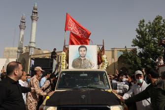 Iran buries slain Revolutionary Guards colonel, vows revenge