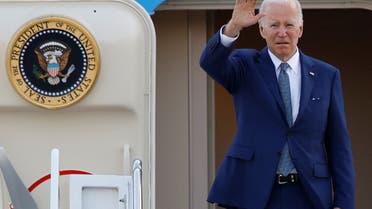 U.S. President Joe Biden gestures as he boards Air Force One to depart from Yokota Air Base in Fussa, on the outskirts of Tokyo, Japan May 24, 2022. REUTERS/Kim Kyung-Hoon