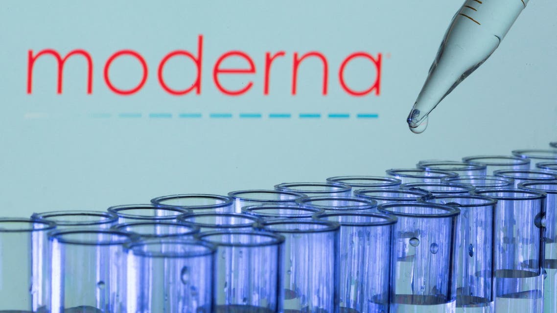 Test tubes are seen in front of a displayed Moderna logo in this illustration taken, May 21, 2021. (File photo: Reuters)