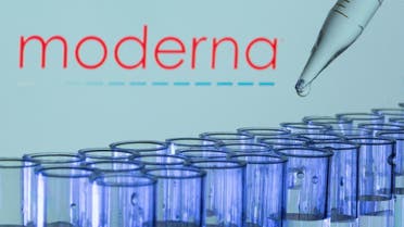 Test tubes are seen in front of a displayed Moderna logo in this illustration taken, May 21, 2021. (File photo: Reuters)