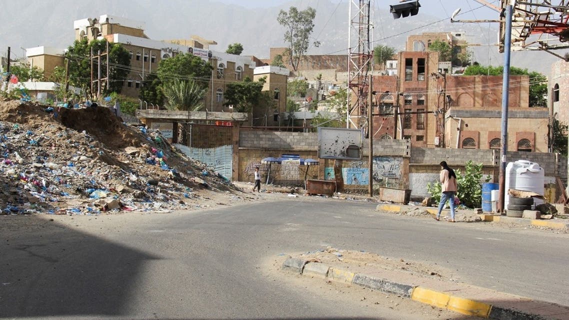 People walk on an empty street in the city of Taiz, Yemen on May 15, 2022. (Reuters)