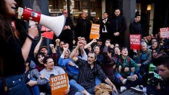 Climate protesters block TotalEnergies meeting in Paris