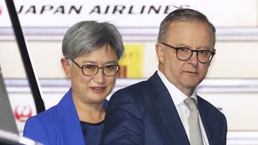 Australian Prime Minister Anthony Albanese, alongside Australian Foreign Minister Penny Wong, arrives at Haneda Airport in Tokyo, ahead of the Quad Leaders' Summit, between the United States, Japan, India and Australia, Japan May 23, 2022, in this photo taken by Kyodo. (Reuters)