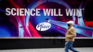 A person walks past the Pfizer Headquarters building in the Manhattan borough of New York City, New York, US. (File photo: Reuters)