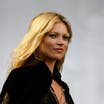 British model Kate Moss says Johnny Depp never threw her down any stairs