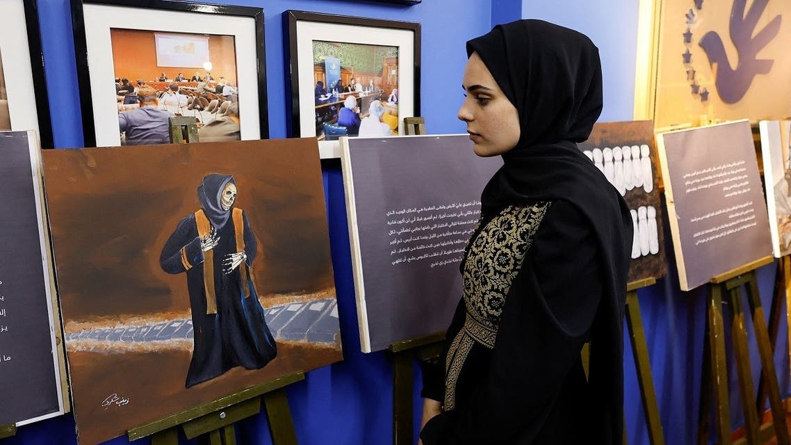 Zainab al-Qolaq, 22-year-old Gazan artist, exhibits her paintings in in Gaza City on May 24, 2022. (Reuters)