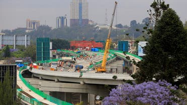 Workers are seen on site during the construction of the Nairobi Expressway, undertaken by the China Road and Bridge Corporation (CRBC) on a public-private partnership (PPP) basis, along Uhuru Highway in Nairobi, Kenya October 20, 2021. (File photo: Reuters)