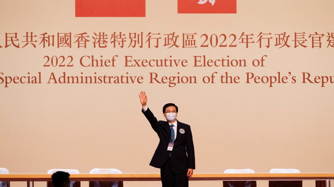 John Lee waves on stage after being elected as Hong Kong's Chief Executive, in Hong Kong, China, May 8, 2022. (File photo: Reuters)