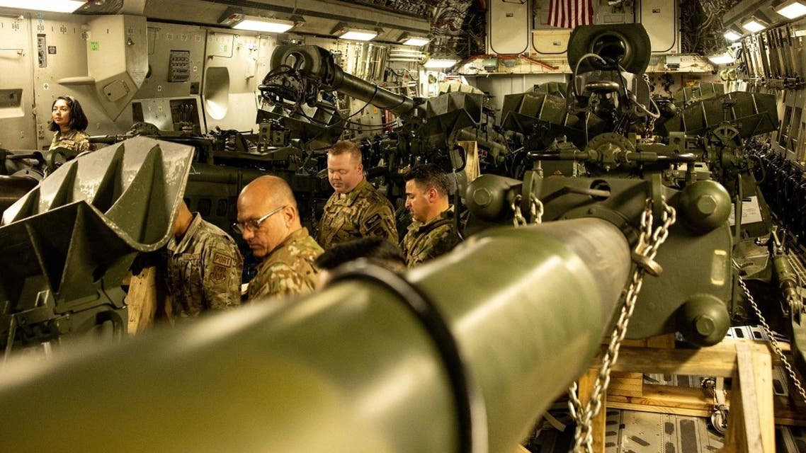 US Marines load an M777 towed 155 mm howitzer into the cargo hold of a US Air Force C-17 Globemaster III transport plane, to be delivered in Europe for Ukrainian forces, at March Air Reserve Base, California, US April 21, 2022. (US Marine Corps/Cpl. Austin Fraley/Handout via Reuters)