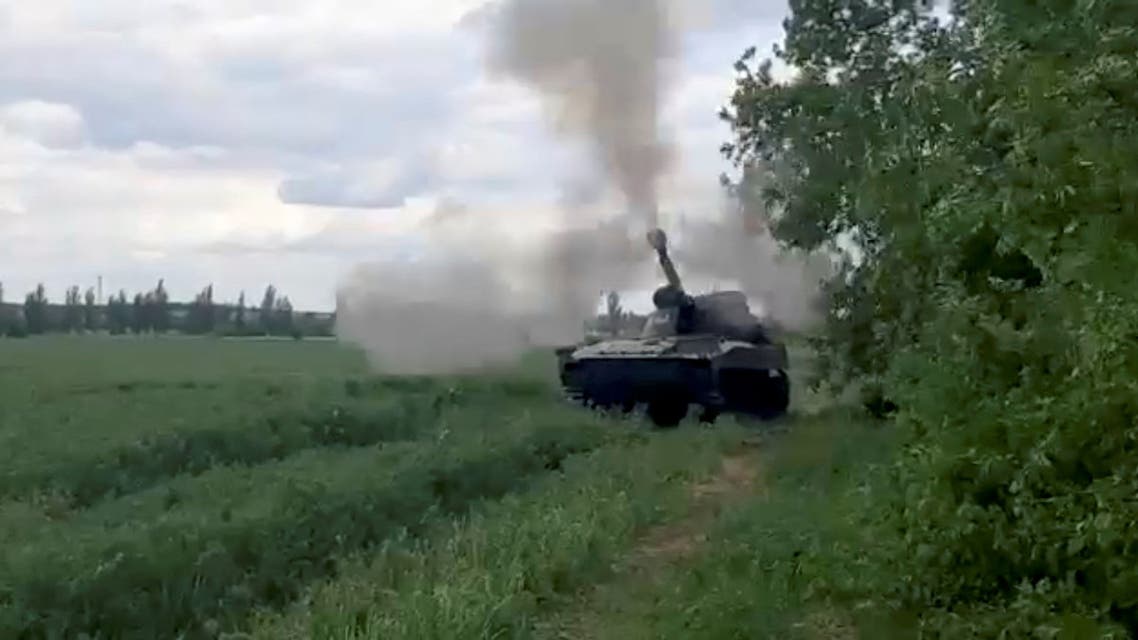 A howitzer is fired in location given as Donbas region, Ukraine in this still image taken from a video obtained by Reuters May 23, 2022. THIS IMAGE HAS BEEN SUPPLIED BY A THIRD PARTY.