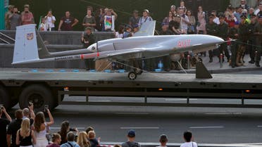 FILE - A Turkish-made Bayraktar TB2 drone is displayed during a rehearsal of a military parade dedicated to Independence Day in Kyiv, Ukraine, Aug. 20, 2021. The drones, which carry lightweight, laser-guided bombs, have carried out unexpectedly successful attacks in the early stages of Ukraine's conflict with Russia. (AP Photo/Efrem Lukatsky, File)