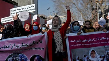 Afghan women shout slogans during a rally to protest against what the protesters say is Taliban restrictions on women, in Kabul, Afghanistan, December 28, 2021. REUTERS/Ali Khara