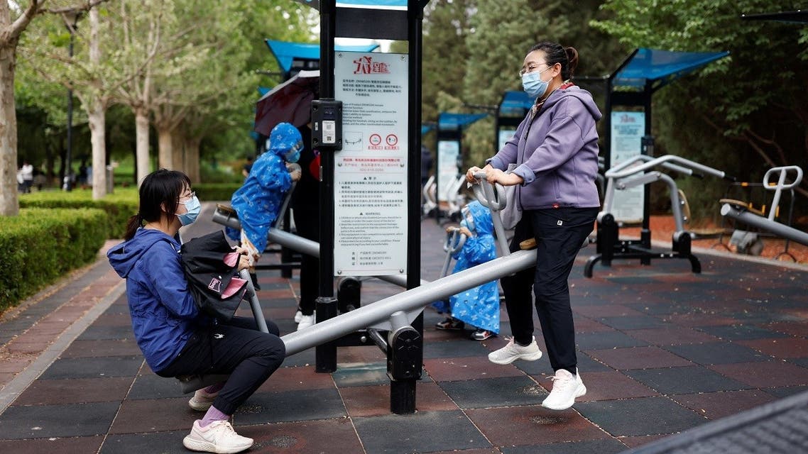 People use attractions at Sun Park on the day of its reopening after the government eased some of the restrictions, amid the coronavirus outbreak in Beijing, China, on May 29, 2022. (Reuters)