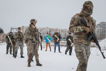 Veterans of the Ukrainian National Guard Azov battalion conduct military exercises for civilians amid threat of Russian invasion, in Kyiv, Ukraine February 6, 2022. REUTERS/Gleb Garanich