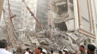 A 10-storey residential and commercial building collapsed on May 23 in Abadan, Iran, killing dozens. (Twitter)