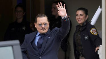 Actor Johnny Depp gestures as he leaves the Fairfax County Circuit Courthouse following his defamation trial against his ex-wife Amber Heard, in Fairfax, Virginia, US, on May 27, 2022. (Reuters)