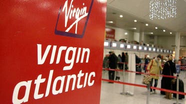 A Virgin Atlantic logo is seen at check-in desks at Gatwick airport, in southern England. (File photo: Reuters)