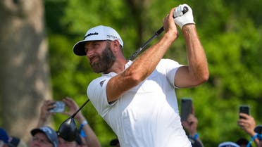 May 19, 2022; Tulsa, OK, USA; Dustin Johnson plays a shot on the 13th tee during the first round of the PGA Championship golf tournament at Southern Hills Country Club. Mandatory Credit: Michael Madrid-USA TODAY Sports