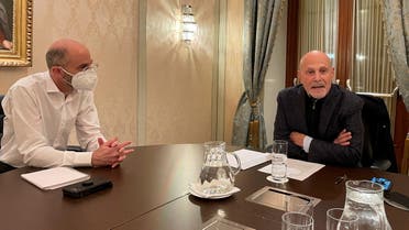 US Special Envoy for Iran Robert Malley and Barry Rosen, campaigning for the release of hostages imprisoned by Iran, sit at a table during an interview with Reuters in Vienna, Austria, January 23, 2022. (File photo: Reuters)
