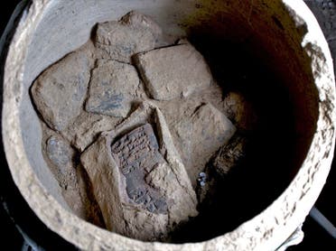 View into one of the pottery vessels with cuneiform tablets, including one tablet which is still in its original clay envelope in Iraq. (University of Tubingen)