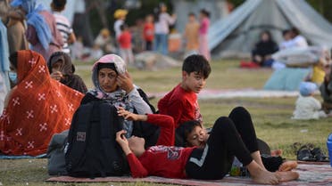 Afghan refugees seeking asylum abroad gather at an open field in protest to demand help from the United Nations High Commissioner for Refugees (UNHCR), in Islamabad on May 7, 2022. (File photo: AFP)