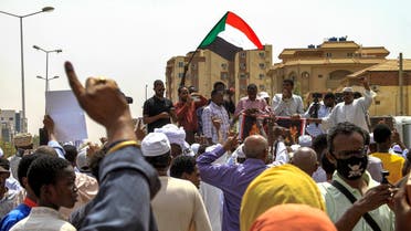 People gather for a protest outside the UN mission in Sudan's capital Khartoum on June 1, 2022. (AFP)