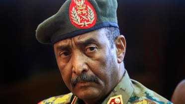 (FILES) In this file photo taken on October 26, 2021 Sudan's top army general Abdel Fattah al-Burhan gives a press conference at the General Command of the Armed Forces in Khartoum. Sudan's army chief Abdel Fattah al-Burhan on May 29, 2022 lifted a state of emergency imposed since last year's military coup, the ruling sovereign council said. Burhan issued a decree lifting the state of emergency nationwide, the council said in a statement. The order was made to prepare the atmosphere for a fruitful and meaningful dialogue that achieves stability for the transitional period, it added. (Photo by Ashraf SHAZLY / AFP) / NO USE AFTER JUNE 28, 2022 18:58:31 GMT