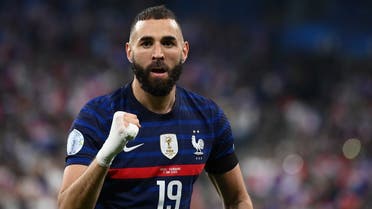 France’s forward Karim Benzema celebrates after scoring the opening goal during the UEFA Nations League - League A Group 1 first leg football match between France and Denmark at the Stade de France in Saint-Denis, north of Paris, on June 3, 2022. (AFP)