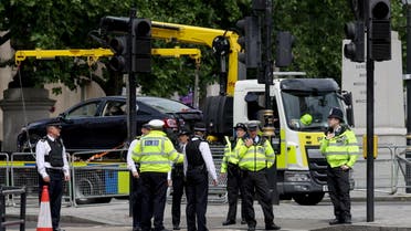 A police vehicle removes a car following a security incident near Trafalgar Square, as Queen Elizabeth's Platinum Jubilee celebrations continue, in London, Britain, June 4, 2022. REUTERS/Phil Noble