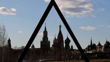 The Kremlin's Spasskaya Tower and St. Basil's Cathedral are seen through the art object in Zaryadye park in Moscow, Russia March 15, 2022. (File Photo: Reuters)