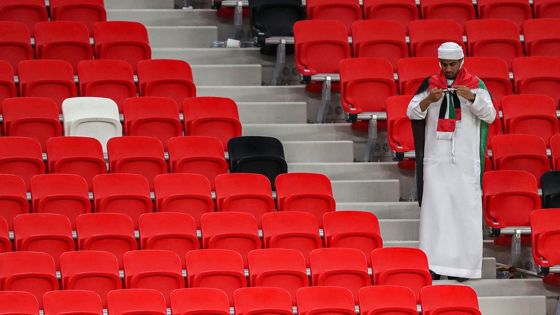 A UAE supporter reacts after their team lost the FIFA World Cup 2022 play-off qualifier football match between UAE and Australia at Ahmad bin Ali stadium in Qatar's Ar-Rayyan on June 7, 2022. (AFP)