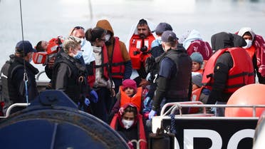 Migrants disembark from a Border Force vessel into Dover Harbour after being rescued while crossing the English Channel in Dover, Britain, May 3, 2022. (File photo: Reuters)