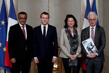 ساندز مع الرئيس الفرنسي ووزير الصحة الفرنسية السابقة ومدير عام منظمة الصحة العاليمة في باريس في 2019
