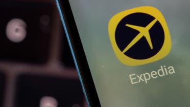 Expedia app is seen on a smartphone in this illustration taken February 27, 2022. (Reuters)