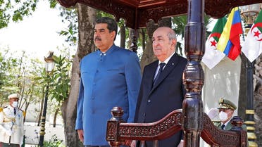 Venezuela’s President Nicolas Maduro (L) being received by Algeria’s President Abdelmadjid Tebboune (R) in the capital Algiers on June 9, 2022 during Maduro’s international tour. (Zurimar Campos/Venezuelan Presidency/AFP)