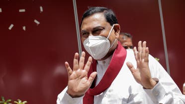 Basil Rajapaksa, one of the brothers of Sri Lanka's president Gotabaya Rajapaksa, gestures as he leaves after he announced that he had resigned from parliament, amid the country's economic crisis, in Colombo, Sri Lanka, June 9, 2022. (Reuters)
