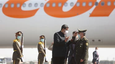 Iranian Defense Minister Brigadier General Mohammad-Reza Ashtiani welcomes Venezuelan President Nicolas Maduro upon his arrival at Mehrabad Airport in Tehran, Iran June 10, 2022. (Reuters)