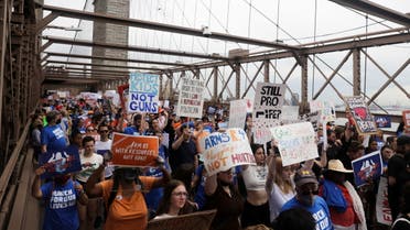 People cross the Brooklyn Bridge as they attend March for Our Lives rally, one of a series of nationwide protests against gun violence, New York City, US, June 11, 2022. (Reuters)