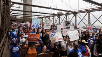 Thousands rally for gun reform in US after surge in mass shootings