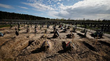 FILE PHOTO: A view of new graves for people killed during Russia's invasion of Ukraine, at a cemetery in Bucha, Kyiv region, Ukraine April 28, 2022. REUTERS/Zohra Bensemra/File Photo