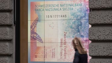 A projection shows a 20 franc banknote in a window in Zurich, Switzerland, on December 16, 2021. (Reuters)