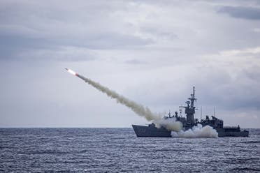 Taiwanese warship launching a US-made Harpoon missile from an unlocated place in the sea near Taiwan. (File Photo: AFP)
