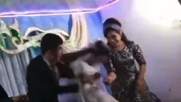 A screengrab from a footage shared on social media shows the groom hitting the bride. (Twitter)