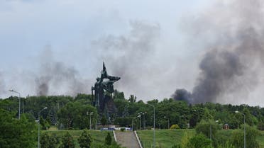 Smoke rises near the World War Two monument following recent shelling during Ukraine-Russia conflict in Donetsk, Ukraine June 18, 2022. (Reuters)