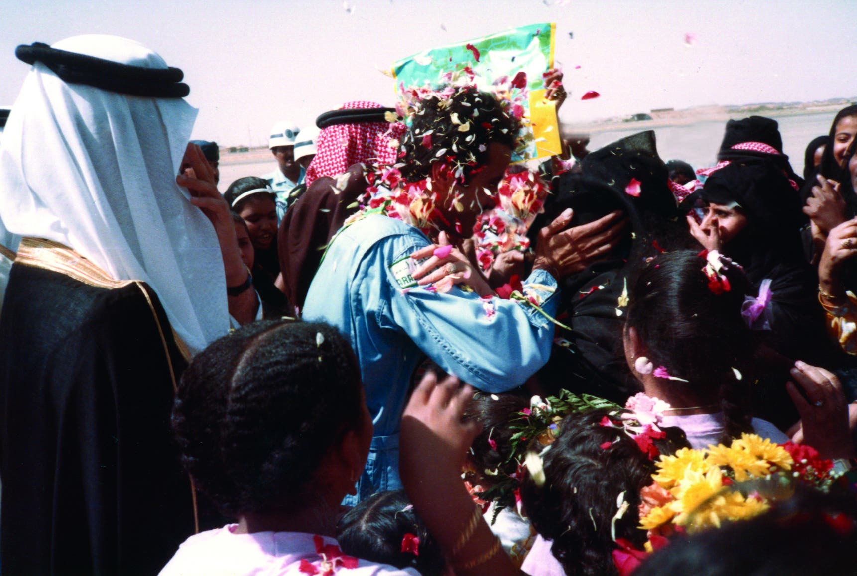 Prince Sultan being welcomed home by his mother, the late Princess Sultana Al Suairi, at al-Hawiyya Airport in Taif. (Supplied)