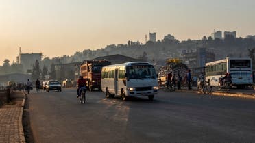 A mini-bus drives down a street in Kigali, Rwanda June 15, 2022. REUTERS/Jean Bizimana