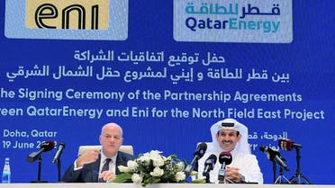 Claudio Descalzi, CEO of Italian energy company Eni and Qatar's Minister of State for Energy and CEO of QatarEnergy Saad al-Kaabi attend the signing ceremony of the partnership between QatarEnergy and Eni for the North Field East Project at the QatarEnergy headquarters in Doha, Qatar June 19, 2022. (Reuters)