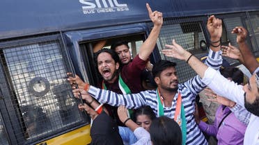 Indian Youth Congress supporters, are detained by the police during a protest against the Agneepath recruitment scheme on a street in Mumbai, India, on June 18, 2022. (Reuters)
